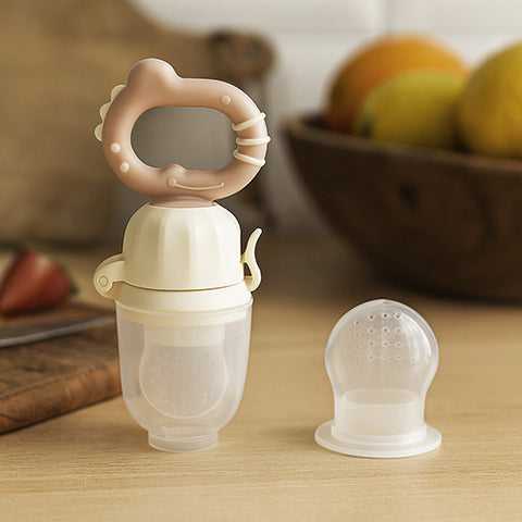BabyOno Twist-out baby food feeder DINO