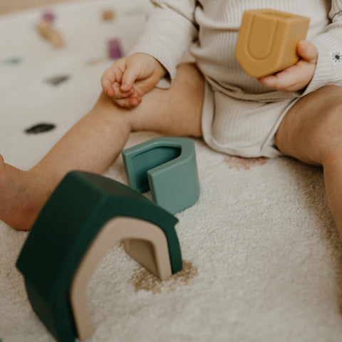 PETITE&MARS Silicone stacking toy House Intense Ochre 12m+